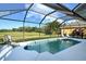 Private screened pool with golf course view at 676 Planters Manor Way, Bradenton, FL 34212