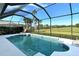 Relaxing screened pool overlooking a golf course at 676 Planters Manor Way, Bradenton, FL 34212