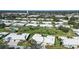 An aerial view of a neighborhood with single-Gathering homes and a large lawn at 6810 9Th W Ave, Bradenton, FL 34209