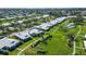 Aerial view showcasing the condo's location within a well-maintained community at 6810 9Th W Ave, Bradenton, FL 34209