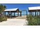 Entrance to Anna Maria City Pier with walkway and beach views at 6810 9Th W Ave, Bradenton, FL 34209