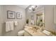 Clean bathroom with updated vanity and shower at 6810 9Th W Ave, Bradenton, FL 34209