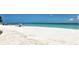 Scenic beach view with clear water and white sand at 6810 9Th W Ave, Bradenton, FL 34209