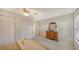 Bedroom with carpeted floor, dresser and window at 6810 9Th W Ave, Bradenton, FL 34209