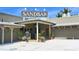 Sandbar Restaurant entrance with signage and outdoor seating area at 6810 9Th W Ave, Bradenton, FL 34209