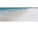 Expansive sandy beach with gentle waves at 6810 9Th W Ave, Bradenton, FL 34209