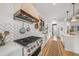 Modern kitchen with stainless steel appliances and white shaker cabinets at 689 Lands End Dr, Longboat Key, FL 34228