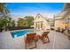Enjoy the refreshing pool with comfortable seating at 689 Lands End Dr, Longboat Key, FL 34228