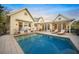 Inviting pool area with lounge chairs, ready for relaxation at 689 Lands End Dr, Longboat Key, FL 34228