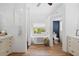 Spa-like bathroom with freestanding tub, walk-in shower, and dual vanity at 7737 40Th E Ct, Sarasota, FL 34243
