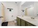 Bathroom with double vanity, shower, and neutral decor at 7737 40Th E Ct, Sarasota, FL 34243