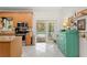 Kitchen with pool view and light-colored cabinets at 7737 40Th E Ct, Sarasota, FL 34243