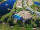 Aerial view of community pool and clubhouse at 8115 Miramar Way # 202, Lakewood Ranch, FL 34202