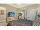 Bedroom with a double bed, dresser and large closet at 8115 Miramar Way # 202, Lakewood Ranch, FL 34202