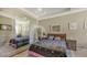Bright bedroom with a double bed and mirrored closet at 8115 Miramar Way # 202, Lakewood Ranch, FL 34202
