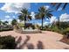 Circular community fountain with palm trees and benches at 8115 Miramar Way # 202, Lakewood Ranch, FL 34202