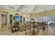 Relaxing community room with comfortable seating and large TV at 8115 Miramar Way # 202, Lakewood Ranch, FL 34202