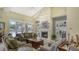 Community room features a fireplace and comfortable seating at 8115 Miramar Way # 202, Lakewood Ranch, FL 34202