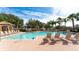Inviting resort-style pool with plenty of lounge chairs at 8115 Miramar Way # 202, Lakewood Ranch, FL 34202
