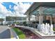 Entrance to the University Town Center mall with lush landscaping and fountains at 8115 Miramar Way # 202, Lakewood Ranch, FL 34202