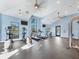 Well-equipped fitness center with treadmills, elliptical machines, and weight equipment overlooking scenic views at 9230 Isabella Cir, Parrish, FL 34219