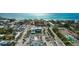 Aerial view of beach community, showing beach, ocean, and nearby buildings at 9490 High Gate Dr # 2013, Sarasota, FL 34238