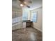 Bright bedroom featuring tile floors, built-in desk, and double closets at 4615 Hidden View Pl # 26, Sarasota, FL 34235