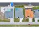 Aerial view showing multiple houses and a canal at 10442 Winnipeg St, Port Charlotte, FL 33981
