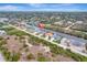 Aerial view of a waterfront property with a canal view at 10442 Winnipeg St, Port Charlotte, FL 33981