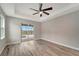 Bedroom with sliding glass doors that lead to the pool area at 10442 Winnipeg St, Port Charlotte, FL 33981