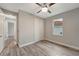 Bright bedroom with wood-look floors and double door closet at 10442 Winnipeg St, Port Charlotte, FL 33981