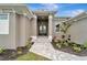Home entrance with double doors and stone walkway at 10442 Winnipeg St, Port Charlotte, FL 33981