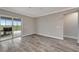 Gathering room with sliding glass doors opening to a relaxing outdoor space at 10442 Winnipeg St, Port Charlotte, FL 33981