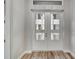 White double door entry with glass panels at 10442 Winnipeg St, Port Charlotte, FL 33981