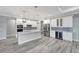 Modern kitchen with white cabinets and large island at 10442 Winnipeg St, Port Charlotte, FL 33981
