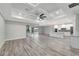 Open living space with hardwood floors and high ceilings at 10442 Winnipeg St, Port Charlotte, FL 33981