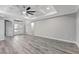 Spacious living area with hardwood floors and coffered ceilings at 10442 Winnipeg St, Port Charlotte, FL 33981