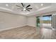 Main bedroom with sliding glass doors to pool area at 10442 Winnipeg St, Port Charlotte, FL 33981