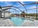 Enjoy this amazing screened-in pool and spa area at 10442 Winnipeg St, Port Charlotte, FL 33981
