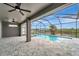 Relaxing pool and spa area with screened enclosure at 10442 Winnipeg St, Port Charlotte, FL 33981