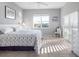 Spacious bedroom with king bed and water views at 114 Gull Dr, Anna Maria, FL 34216