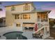 Inviting pool area with lounge chairs and patio at 114 Gull Dr, Anna Maria, FL 34216