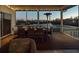 Relaxing screened porch overlooking the water at 114 Gull Dr, Anna Maria, FL 34216