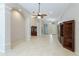 Spacious living area with tile floors and a view to the entryway at 11662 Old Cypress Cv, Parrish, FL 34219