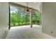 Spacious screened porch overlooking backyard at 11662 Old Cypress Cv, Parrish, FL 34219