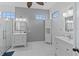 Spa-like bathroom with double vanity and walk in shower at 11813 Holly Hock Dr, Lakewood Ranch, FL 34202