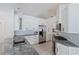 Updated kitchen featuring granite countertops and stainless steel appliances at 11813 Holly Hock Dr, Lakewood Ranch, FL 34202