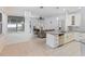 Bright kitchen features granite countertops and stainless steel appliances at 11813 Holly Hock Dr, Lakewood Ranch, FL 34202