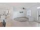 Bright living room with an open floor plan, showcasing a kitchen at 11813 Holly Hock Dr, Lakewood Ranch, FL 34202
