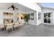 Spacious patio with dining table and chairs, ideal for outdoor entertaining at 11813 Holly Hock Dr, Lakewood Ranch, FL 34202